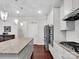 Kitchen with an island, stainless steel appliances, and beautiful granite countertops at 1501 Allegheny Way, Waxhaw, NC 28173