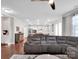 Comfortable living room with a large sectional sofa open to the kitchen at 1501 Allegheny Way, Waxhaw, NC 28173