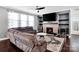Relaxing living room with a fireplace and neutral tones, perfect for entertaining at 1501 Allegheny Way, Waxhaw, NC 28173