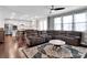 Spacious living room flows into the kitchen with plenty of natural light at 1501 Allegheny Way, Waxhaw, NC 28173