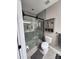 Updated bathroom featuring a glass enclosed shower and neutral finishes and updated fixtures at 18224 Taffrail Way, Cornelius, NC 28031
