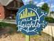 Villa Heights neighborhood sign against a backdrop of tree and brick house at 1900 Union St, Charlotte, NC 28205