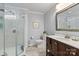 Bathroom featuring a glass-enclosed shower, vanity with sink, toilet, and stylish neutral color palette at 1923 Tracy Ct, Fort Mill, SC 29708