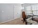 A bedroom featuring a desk, neutral walls, and a crib and closet at 1923 Tracy Ct, Fort Mill, SC 29708
