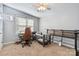 A bedroom featuring a desk, neutral walls, and a crib at 1923 Tracy Ct, Fort Mill, SC 29708
