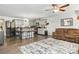 Open-concept living area with island seating, blending modern kitchen with comfortable seating space at 1923 Tracy Ct, Fort Mill, SC 29708