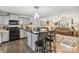 Modern kitchen with open-concept living space featuring an island and bar stool seating with easy flow at 1923 Tracy Ct, Fort Mill, SC 29708