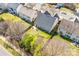 A birds eye view of this home and its neighborhood, featuring mature trees at 2014 Arbor Crest Ct, Charlotte, NC 28262