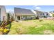 This property boasts a backyard with an attractive patio for outdoor relaxation or entertaining at 2014 Arbor Crest Ct, Charlotte, NC 28262