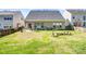This property boasts a backyard with a patio perfect for relaxation or entertaining at 2014 Arbor Crest Ct, Charlotte, NC 28262