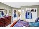 Bedroom with a walk-in closet and natural light at 2014 Arbor Crest Ct, Charlotte, NC 28262