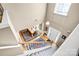 Bright foyer features hardwood floors, and stairway to the second floor, flooded with natural light at 2014 Arbor Crest Ct, Charlotte, NC 28262