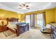 Spacious main bedroom offers ample natural light and leads to an ensuite bath at 2014 Arbor Crest Ct, Charlotte, NC 28262