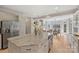 Well-lit kitchen with large island, stainless steel appliances, and view to dining and living areas at 2045 Driftwood Cir, Fort Mill, SC 29708