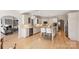 Spacious kitchen with granite countertops, stainless steel appliances, and a view into living room at 2045 Driftwood Cir, Fort Mill, SC 29708