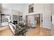 Inviting living room featuring fireplace, built-ins, and access to other areas of the home at 2045 Driftwood Cir, Fort Mill, SC 29708