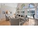 Bright living room with view of lake, open space, vaulted ceiling, and modern decor at 2045 Driftwood Cir, Fort Mill, SC 29708