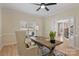 Bright office featuring a rustic desk, stylish rug, and natural light from the window at 2045 Driftwood Cir, Fort Mill, SC 29708