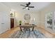 Classic office featuring a rustic desk, stylish rug, a statement clock and natural light from the window at 2045 Driftwood Cir, Fort Mill, SC 29708