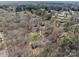 An aerial shot of the property, showing its secluded location surrounded by lush forest and a quiet neighborhood at 220 Gregory Rd, Salisbury, NC 28147