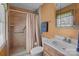 Cozy bathroom featuring a tiled shower with safety bars and modern fixtures at 220 Gregory Rd, Salisbury, NC 28147