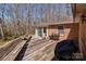 Large deck featuring outdoor seating and a grill, ideal for entertaining friends and Gathering at 220 Gregory Rd, Salisbury, NC 28147