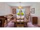 Dining room with natural light, classic decor, and an ornate light fixture at 220 Gregory Rd, Salisbury, NC 28147