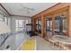 Sunroom with a treadmill, a lounging chair, and views of the backyard at 220 Gregory Rd, Salisbury, NC 28147