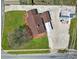 From this aerial view you can see the roof, lawn, and the detached garage on the property at 2301 Shamrock Dr, Charlotte, NC 28205