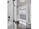 Bathroom boasts tiled shower, modern fixtures, with doorway to another room at 2301 Shamrock Dr, Charlotte, NC 28205