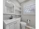 Bathroom featuring white vanity, modern sink and fixtures, and tile flooring at 2301 Shamrock Dr, Charlotte, NC 28205