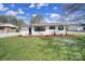 Charming one-story home features updated landscaping and newly painted exterior at 2301 Shamrock Dr, Charlotte, NC 28205