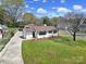Aerial view of charming one-story home with updated landscaping and newly painted exterior at 2301 Shamrock Dr, Charlotte, NC 28205