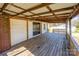 Spacious wooden back deck with an overhead beams offering an ideal spot for outdoor entertaining and relaxation at 260 Penninger Dr, Woodleaf, NC 27054
