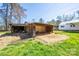 Rustic barn structure with open sides, offering potential for storage or conversion at 260 Penninger Dr, Woodleaf, NC 27054