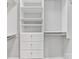 Custom closet with built-in shelving and drawers to maximize storage and organization at 2709 Yadkin Ave, Charlotte, NC 28205