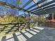 Gray deck with pergola offering an ideal outdoor entertaining space overlooking a natural backdrop at 2709 Yadkin Ave, Charlotte, NC 28205