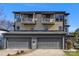 Modern home featuring a two-car garage and balconies on the upper level at 2709 Yadkin Ave, Charlotte, NC 28205