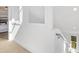 Bright hallway with carpeted floors and natural light showcases a clean and inviting transition space at 2709 Yadkin Ave, Charlotte, NC 28205