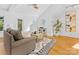 Bright living room with hardwood floors, neutral decor and natural light at 2709 Yadkin Ave, Charlotte, NC 28205