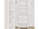 Organized walk-in closet with adjustable shelves and drawers at 2709 Yadkin Ave, Charlotte, NC 28205