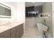 Contemporary bathroom featuring a soaking tub, glass shower, and stylish vanity at 3119 Knowlton Ln, Charlotte, NC 28205