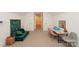 Bright bonus room features neutral carpet, table, a green nugget and three access doors at 3119 Knowlton Ln, Charlotte, NC 28205