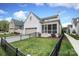 Stylish home featuring a screened porch, fenced yard, and convenient garage at 3119 Knowlton Ln, Charlotte, NC 28205