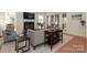 Bright living room with fireplace, stylish furniture, and access to outdoor space at 3119 Knowlton Ln, Charlotte, NC 28205