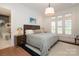 Serene main bedroom featuring large windows and a view of a luxurious ensuite bathroom at 3119 Knowlton Ln, Charlotte, NC 28205