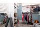Organized walk-in closet featuring custom shelving and ample storage space, perfect for any wardrobe at 3119 Knowlton Ln, Charlotte, NC 28205
