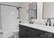 Charming bathroom featuring a marble countertop, dual sinks, and a bathtub-shower combination with black fixtures at 320 Allspice Rd, Fort Mill, SC 29708