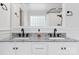 Bright bathroom with dual sinks, granite countertop, and tiled shower at 320 Allspice Rd, Fort Mill, SC 29708