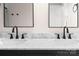 Dual sink bathroom with marble countertop and black fixtures for a clean, modern design at 320 Allspice Rd, Fort Mill, SC 29708